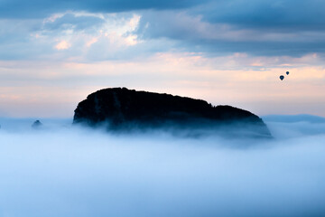 Peak over the clouds with Hot air balloons