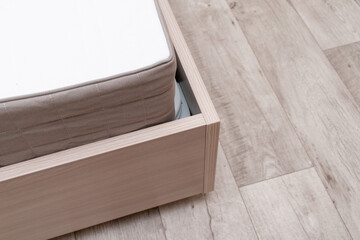 Modern orthopedic mattress on the bed