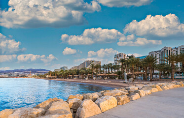 View on central public beach from walking stone pier in Eilat -  southernmost port and famous...