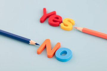 The colored pencil points to yes and no