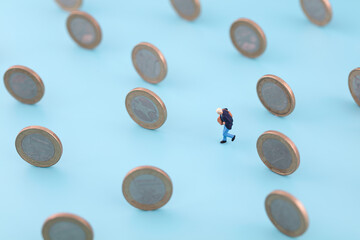 Miniature photography pursues interests and runs in coins