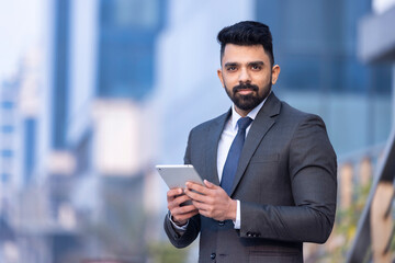 Young businessman with digital tablet