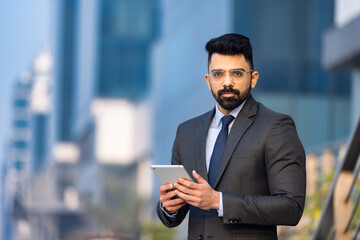 Young businessman with digital tablet