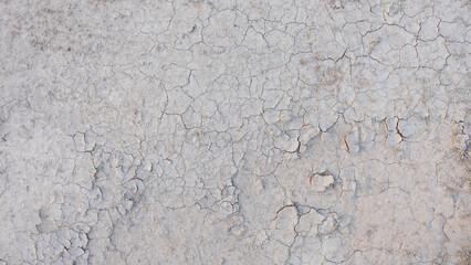 drought cracked soil. White tone. white sand