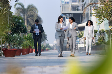 two indian businesswoman decision in outside the office