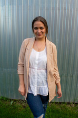 young beautiful woman in a jacket and jeans