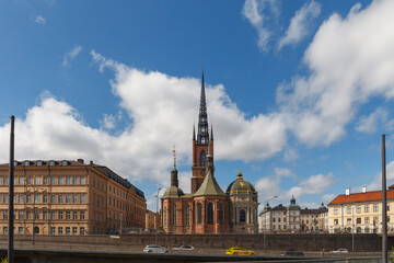 Riddarholmen Church and ornamented spire with scenic street view