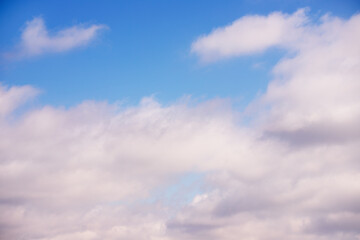 White clouds in the blue sky.