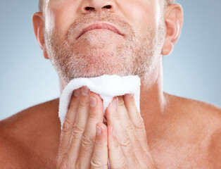 Skincare, old man and towel to dry beard, dermatology and washing with guy on grey studio...