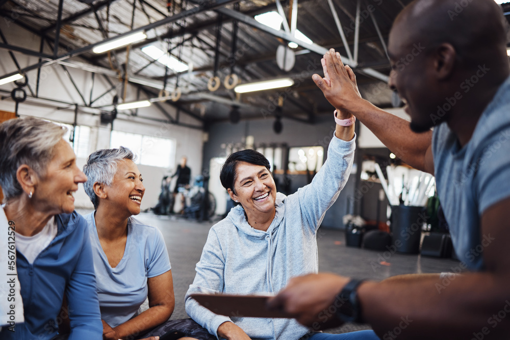 Sticker Senior women, fitness and personal trainer high five for health, routine and workout at a gym. Exercise, elderly and friends with health coach man hands connecting in support of goal collaboration