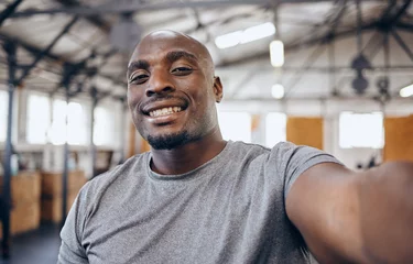 Fotobehang Sportschool Gym, exercise and selfie portrait of black man smile for motivation, wellness and bodybuilder workout. Smile, strong muscles and face of male athlete take picture for training, sports and fitness  © S Fanti/peopleimages.com