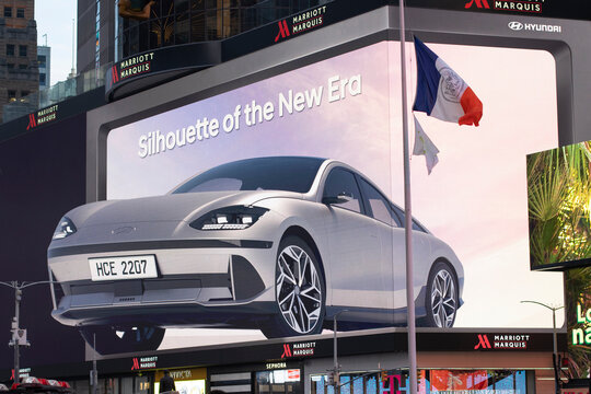 New York, NY, USA - July 2, 2022: Video Ads Of The New Hyundai IONIQ 6 Electric Sedan Is Seen On A Giant Digital Billboard In Times Square, Midtown Manhattan, New York City.