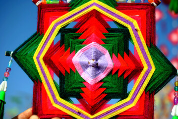 Bringing yarn to invent as decorations in Buddhist festivals