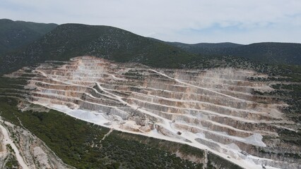 Large limestone quarry,crushed stone in the foreground, top view, mining site, calcium carbonate...