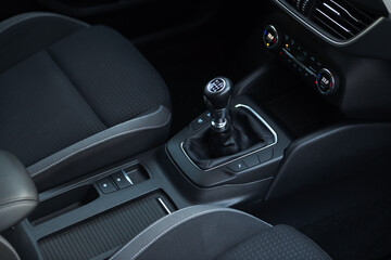 Fototapeta na wymiar Manual gearbox handle in the modern car