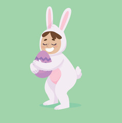 White Easter bunny. A child in a rabbit costume hunts eggs for Easter
