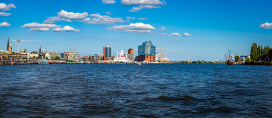 Panorama photography of the Port of Hamburg, with its maritime industry and iconic skyline seen...