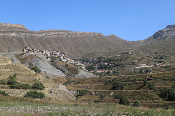 Dagestan.Russia.September 13, 2022. Picteresque  mountain landscape on the backgroun of the small village.Autumn view.