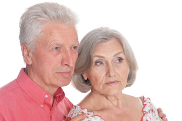 Portrait of sad senior couple isolated