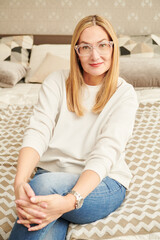 Fototapeta premium mature woman in bedroom