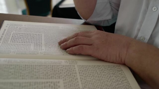 Jewish man read from the Bible