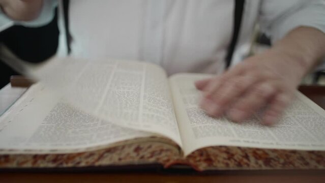 Jewish man read from the Bible