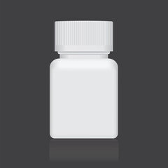White plastic medical container isolated on a black background