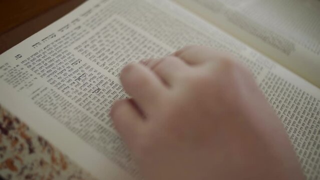 Jewish man read from the Bible torah