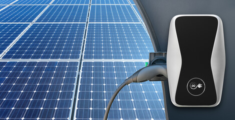 Close up of electric car charging station on the background of solar panels	