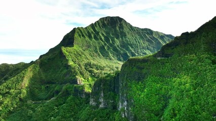 Aerial view Pali Lookout, mountain cliff on Oahu windward side. Drone Hawaii. tourism destination landmark, vacation travel. 