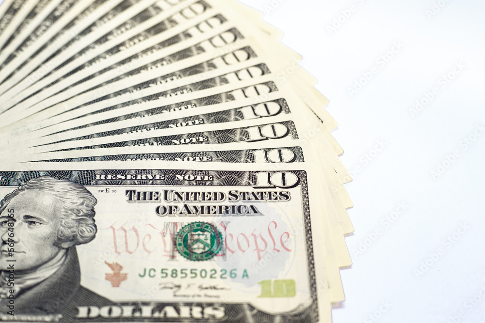 Wall mural group of money dollar banknotes arranged on white background and space for text. dollar banknotes is