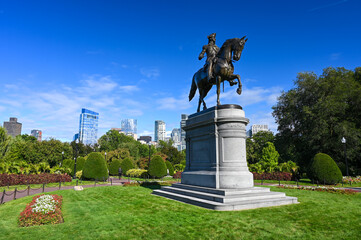 The statue of General George Washington at the entrance to the public gardens of Boston,...