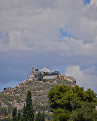 Fototapeta na wymiar Saint George chapel on Lycabettus hill in the center of Athens. Travel in Greece.