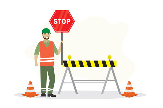 Worker man in uniform holds warning sign, construction area. Way and passage is closed, red sign is stop. Traffic cones and barrier. Repair work on road. Site under construction.