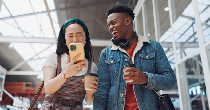 Shopping mall, smartphone and couple of friends on social media, website or blog for discount, sales and travel communication. Diversity gen z people walking, using phone or cellphone and coffee cup