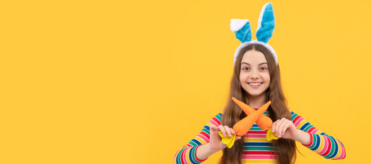 cheerful bunny kid with carrot. happy easter holiday. funny child hold carrot. teenager girl...