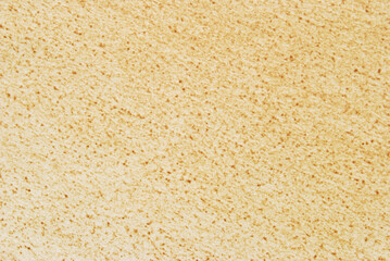 A sheet of old brown spotted cardboard texture as background