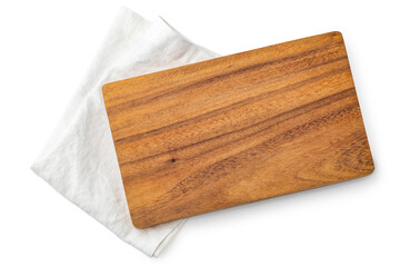 Wooden cutting board on white napkin, serving platter, top view