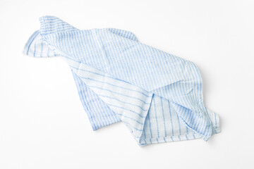 Light blue striped linen napkins on white background