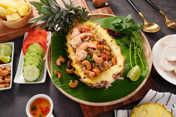 Fried rice with shrimp and pineapple ( Khao Pad Sapparod, Thai food)