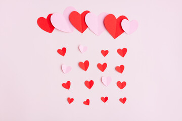 Red and Pink Paper Hearts on pink background, Heart shape papercut , Happy Valentine's day