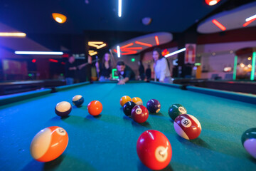 Effortless shots and smooth play on display in a game of billiards, a true testament to the...