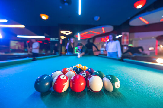 The excitement and challenge of a game of billiards are on full display as players aim for victory and a place at the top of the leaderboard