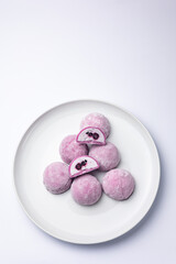 Delicious mochi on a white background, close-up. Traditional Japanese dessert
