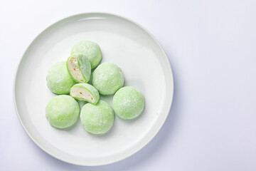 Delicious mochi on a white background, close-up. Traditional Japanese dessert
