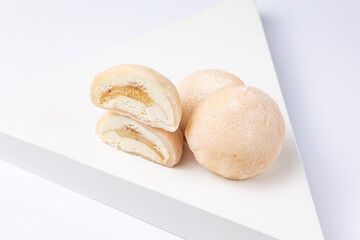 Delicious mochi on a white background, close-up. Traditional Japanese dessert
