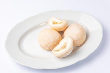 Delicious mochi on a white background, close-up. Traditional Japanese dessert
