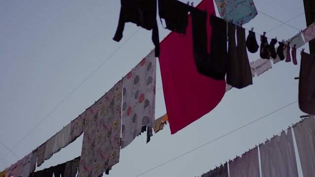 Drying clothes at street. Povetry concept