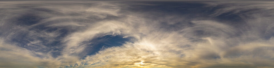 Panorama of a dark blue sunset sky with golden Cumulus clouds. Seamless hdr 360 panorama in spherical equiangular format. Full zenith for 3D visualization, sky replacement for aerial drone panoramas.