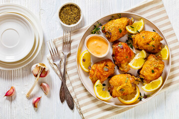 roast chicken thighs with lemon, thyme and spices